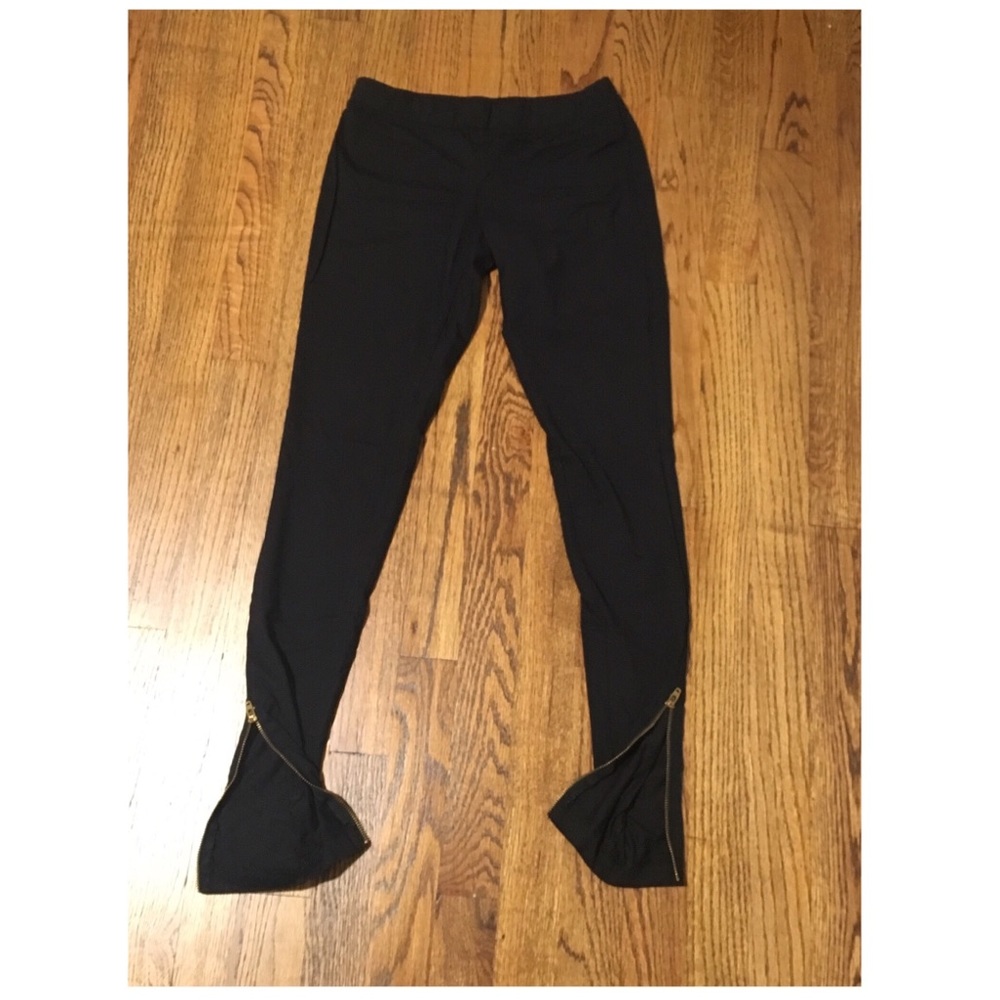 Express black thick leggings with gold zippers